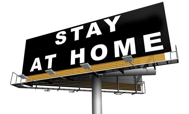stay at home と書いた看板